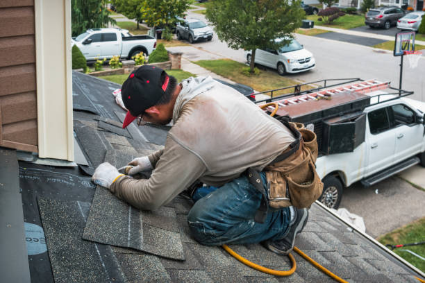 Professional Flat Roof Repair technician working in Lathrop, MO